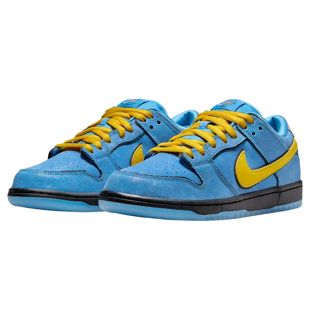 Blue sneakers with yellow laces and Nike logo on a white background