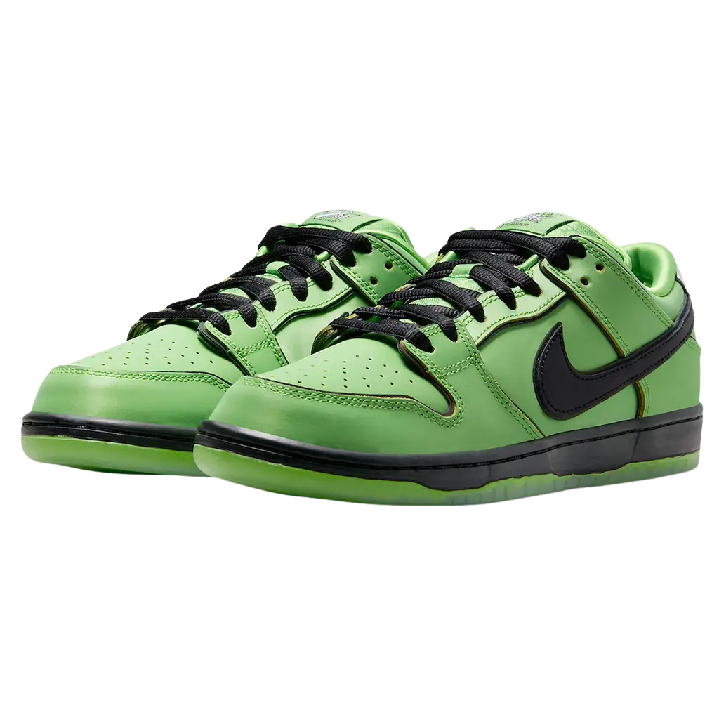 Green sneakers with black accents on a white background