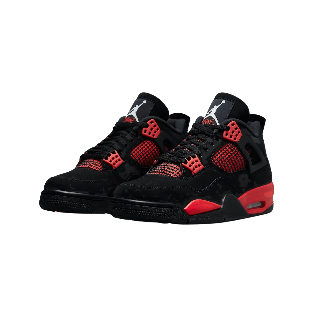 Black and red sneakers with a white background