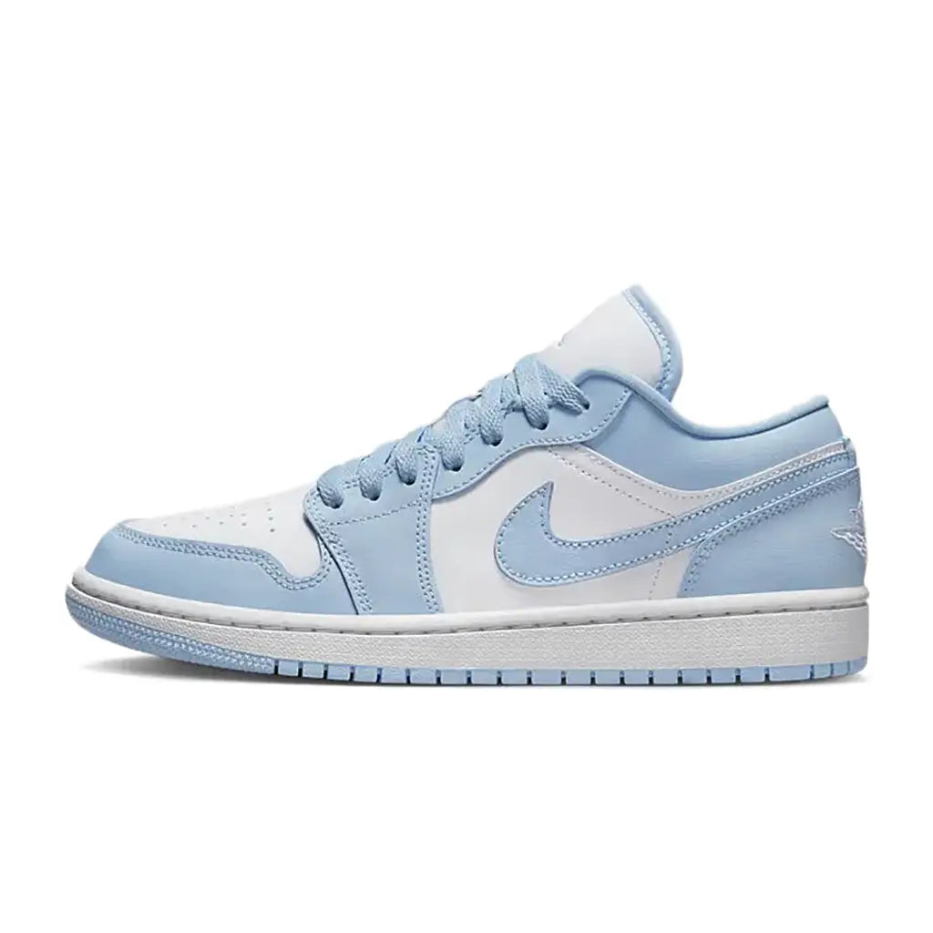 Light blue and white sneaker with Nike logo on a white background
