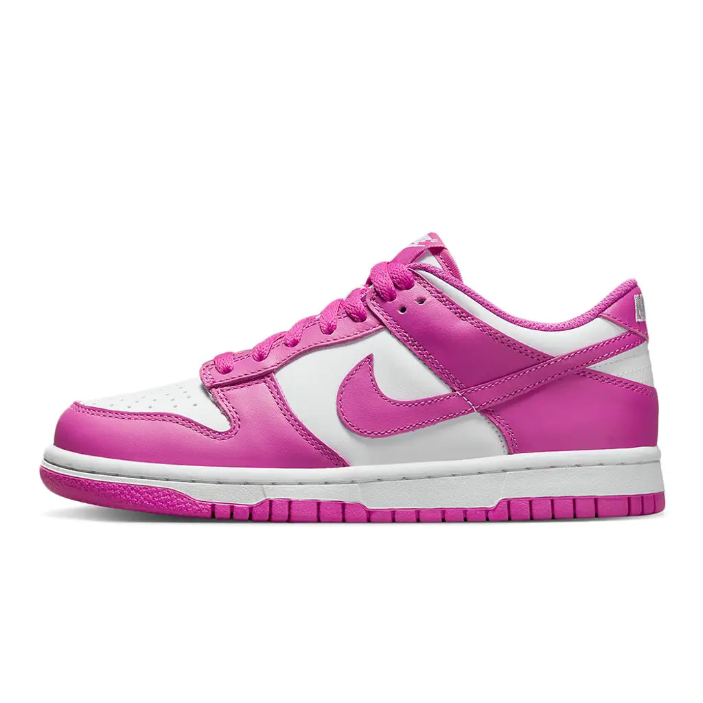 Pink and white sneaker with Nike logo on a white background
