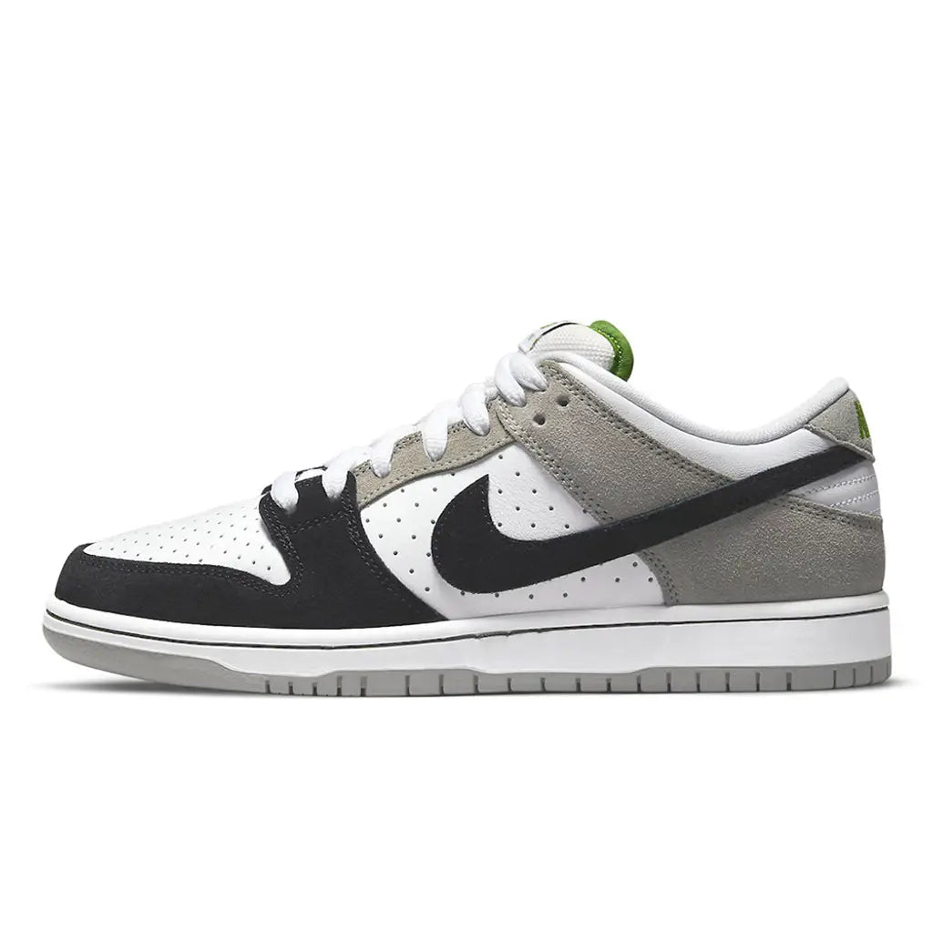 White, black, and gray sneaker with a Nike logo on a white background