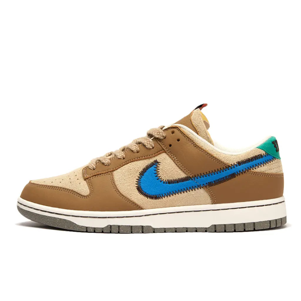 Nike brown shoe with blue Nike tag